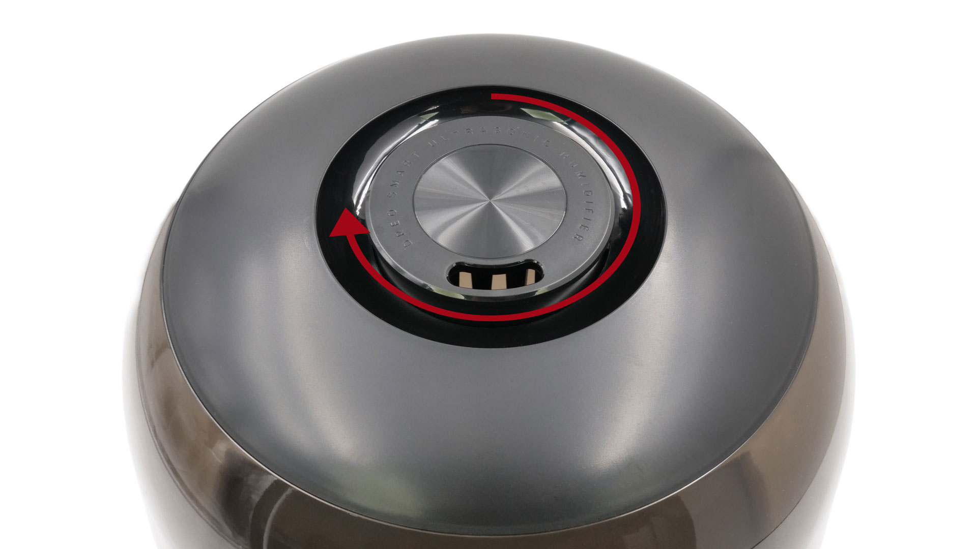 Ein rundes Bauteil an der Oberseite des Modells. Darum herum ist ein runder Pfeil eingezeichnet.